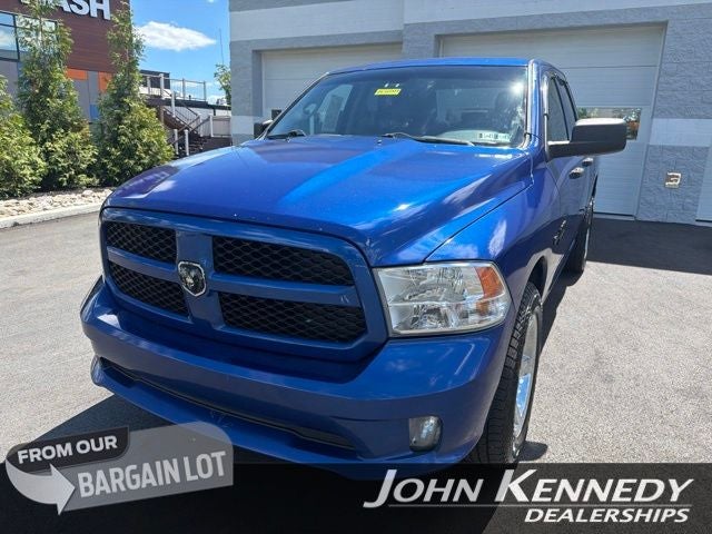 2015 RAM 1500 Express in Blue Streak Pearlcoat — front three-quarter view