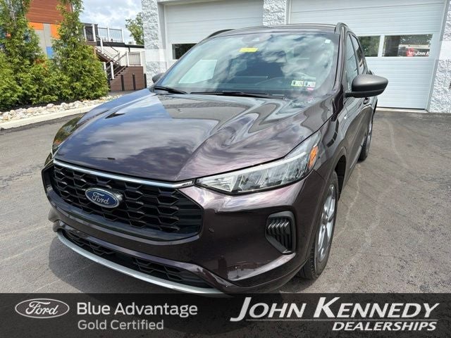 2023 Ford Escape ST-Line in Cinnabar Red — front three-quarter view