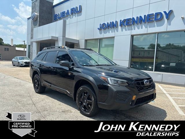 2024 Subaru Outback Wilderness in Crystal Black Silica — front three-quarter view