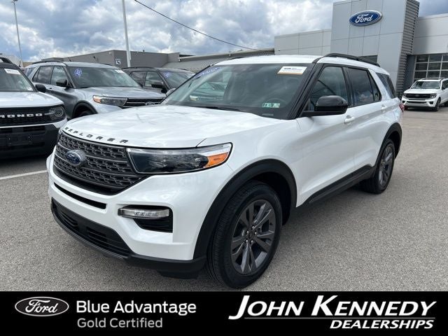 2022 Ford Explorer XLT in Star White Metallic Tri-Coat — front three-quarter view
