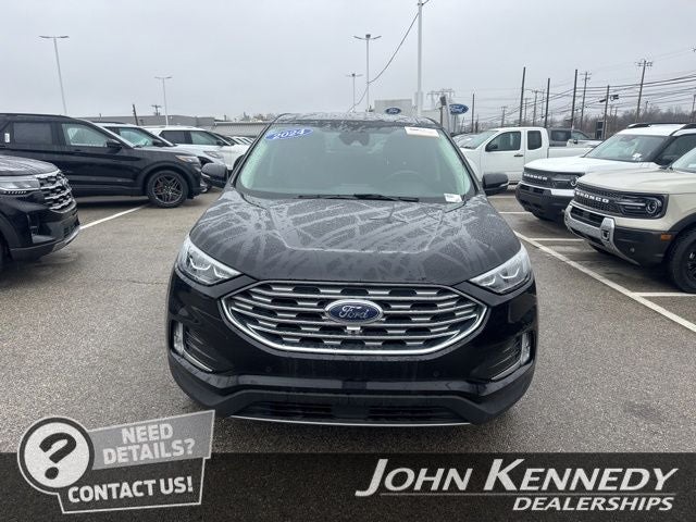 2024 Ford Edge Titanium in Black Metallic — front three-quarter view