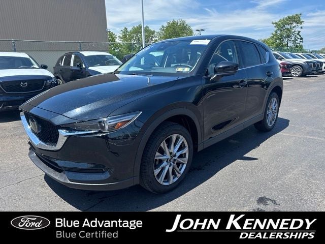 2020 Mazda Mazda CX-5 Grand Touring in Jet Black Mica — front three-quarter view