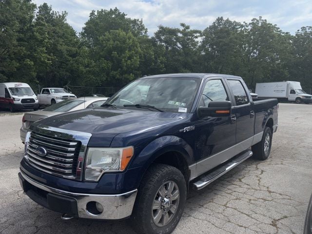 2011 Ford F-150 XLT in Blue — front three-quarter view