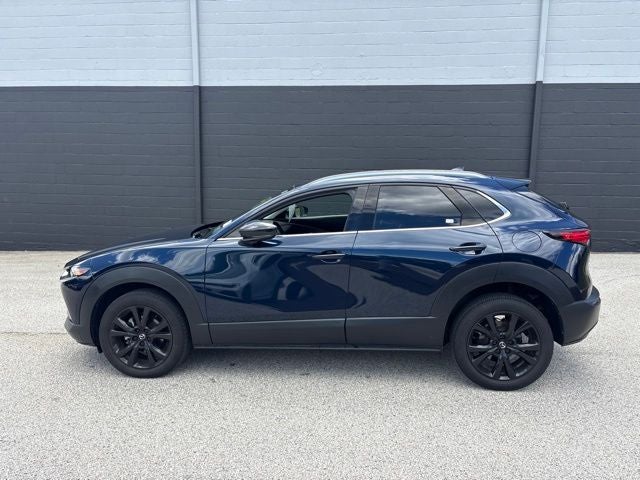 2024 Mazda Mazda CX-30 2.5 Turbo Premium Package in Deep Crystal Blue Mica — front three-quarter view